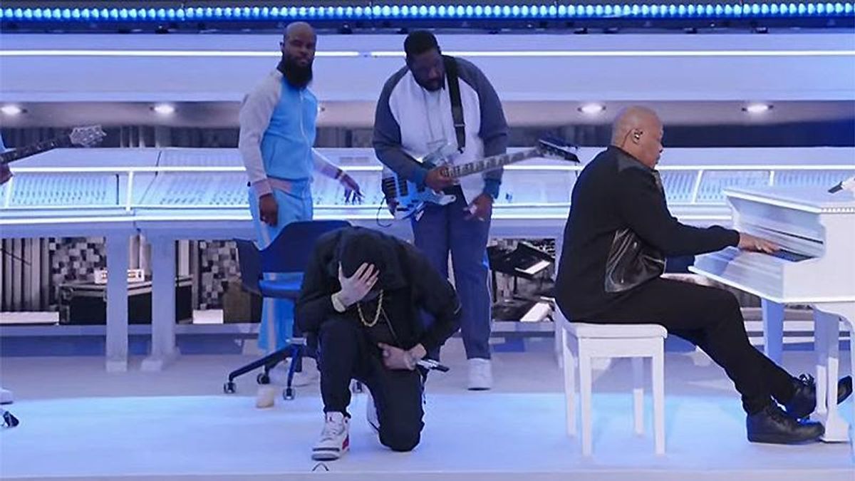 Eminem takes a knee