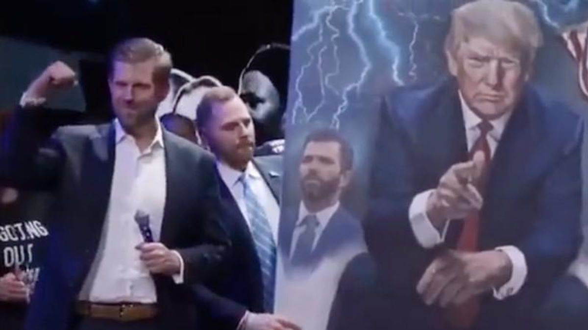 Eric Trump praises huge portrait of his dad at conspiracy theorist conference: ‘I love that’