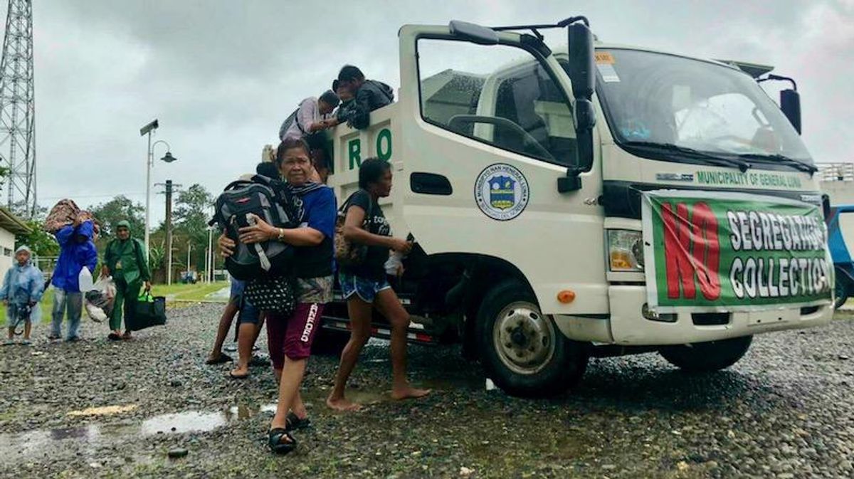 Thousands flee their homes as super typhoon slams into the Philippines