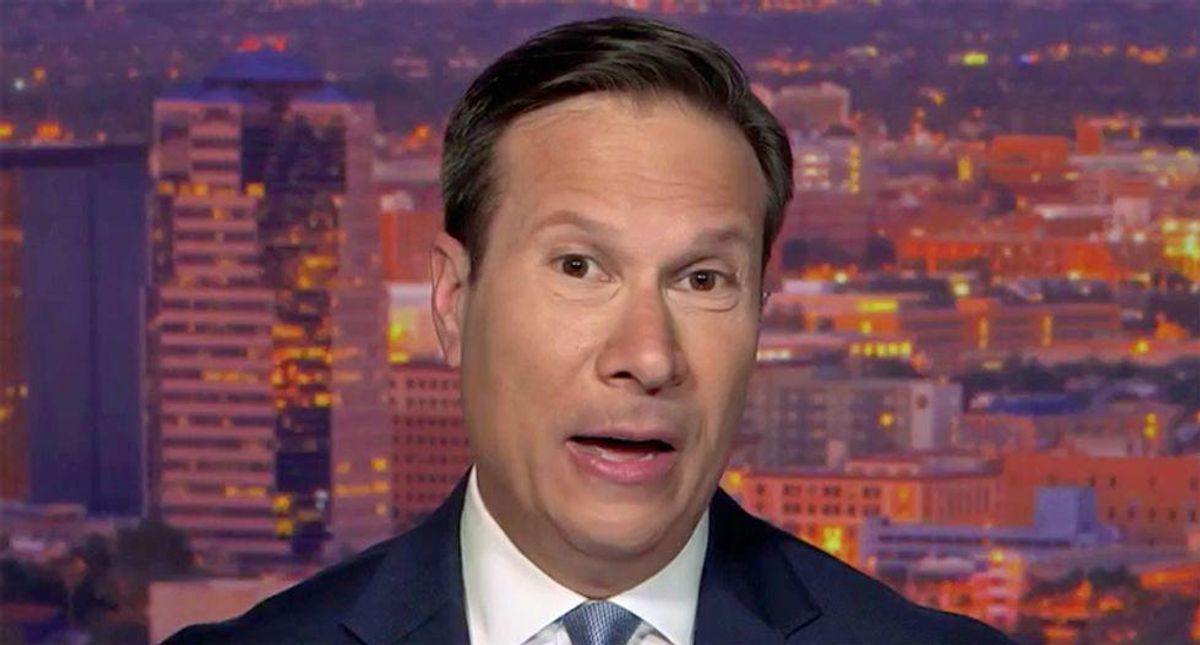 Here's why a former FBI official says it's dangerous to see QAnon people as nutty and give Trump a pass