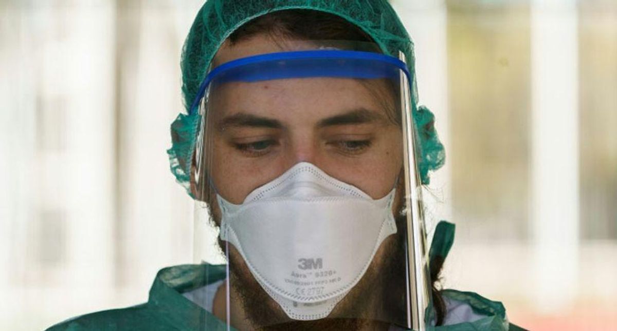 US tops 600,000 COVID deaths, New York and California drop curbs
