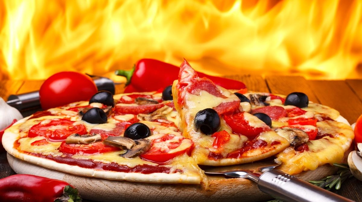 2 dead, 12 injured in Madrid restaurant fire started by waiter flambeing pizza
