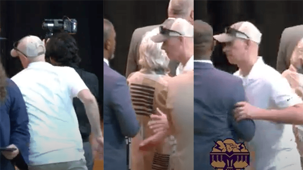 Graduate's father arrested for blocking Black superintendent from shaking daughter's hand