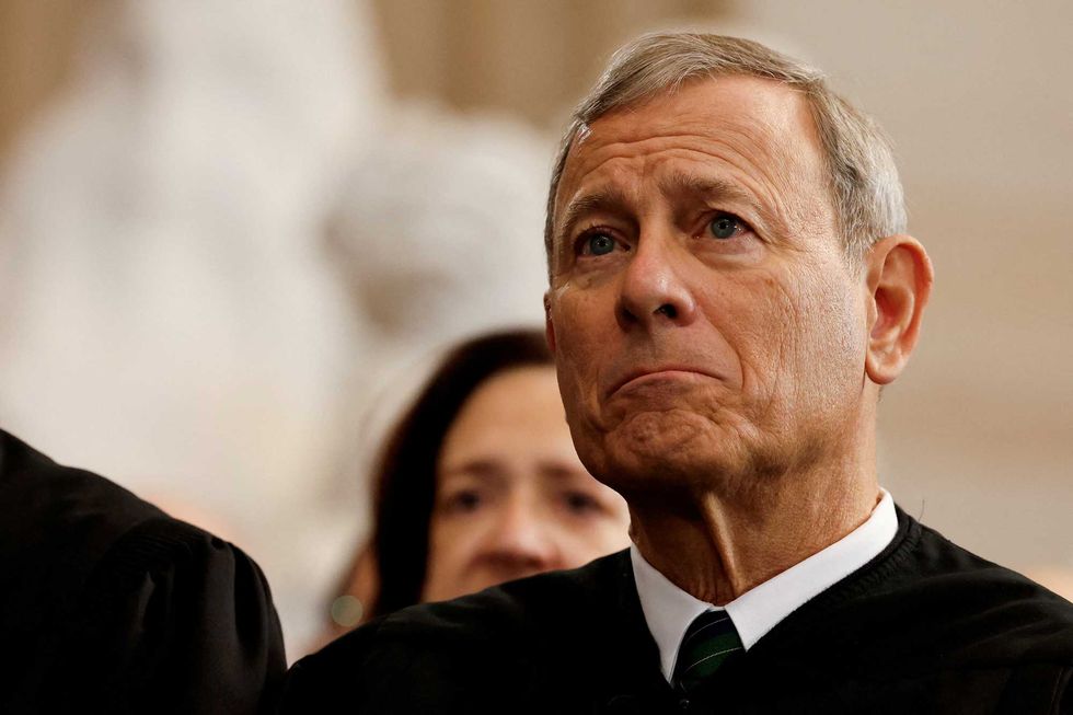 John Roberts might as well wear the robes of the Klan