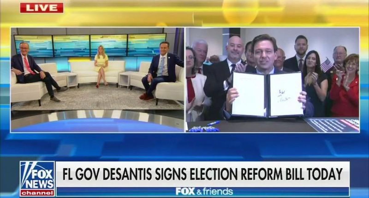 'How fascists operate': Ron DeSantis slammed for signing anti-voting bill behind closed doors for Fox