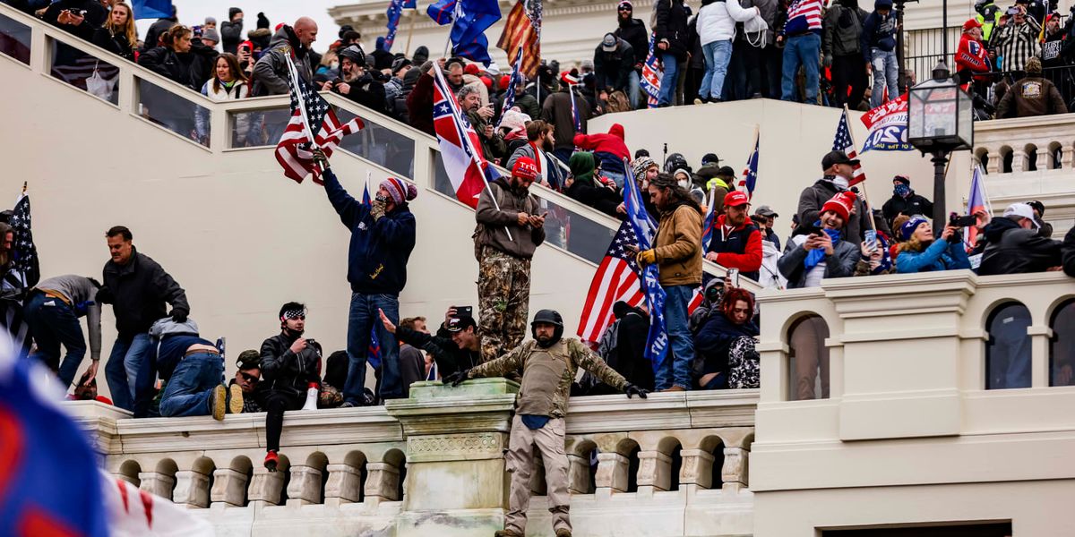 Newly released video appears to show Trump supporter firing gun during ...