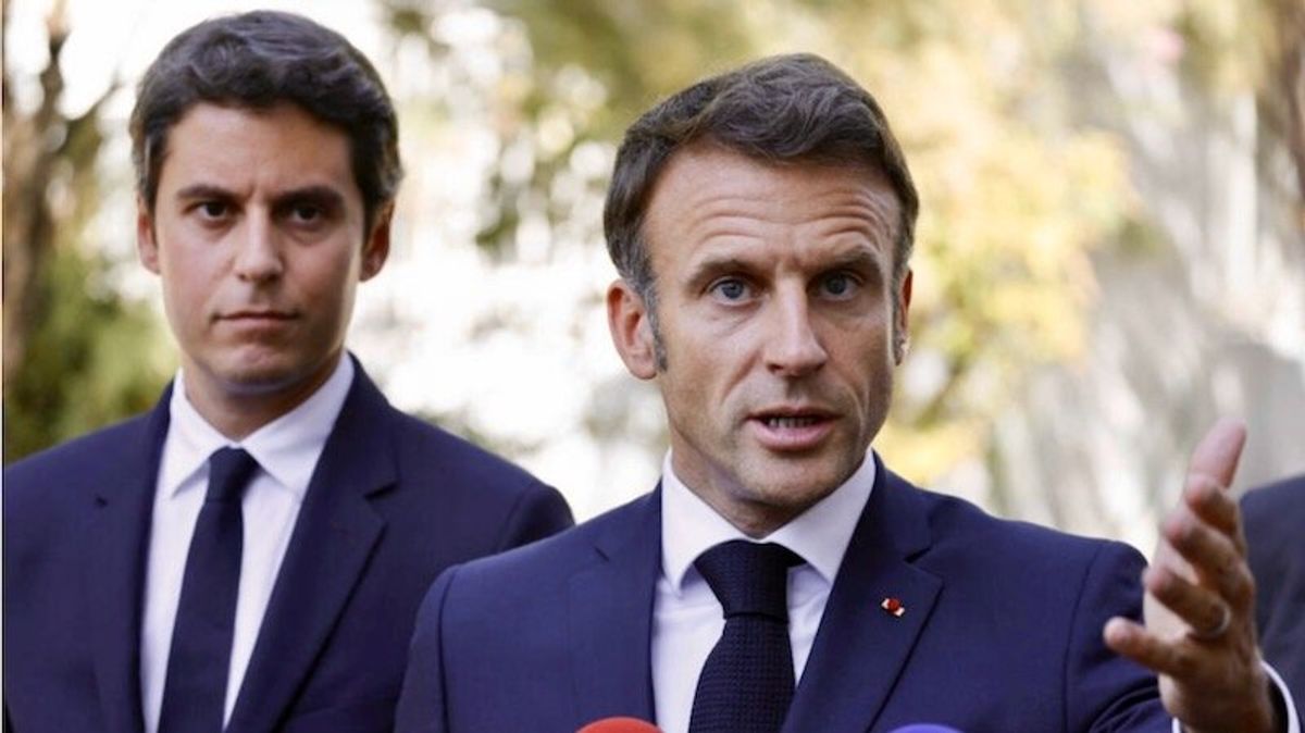 Macron, on Greenland visit, berates Trump for threats against the territory