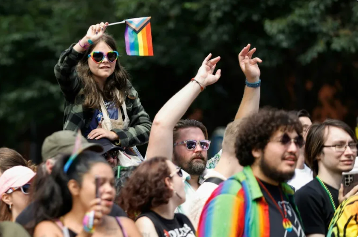Fearing Trump, LGBTQ Americans out in force for vote