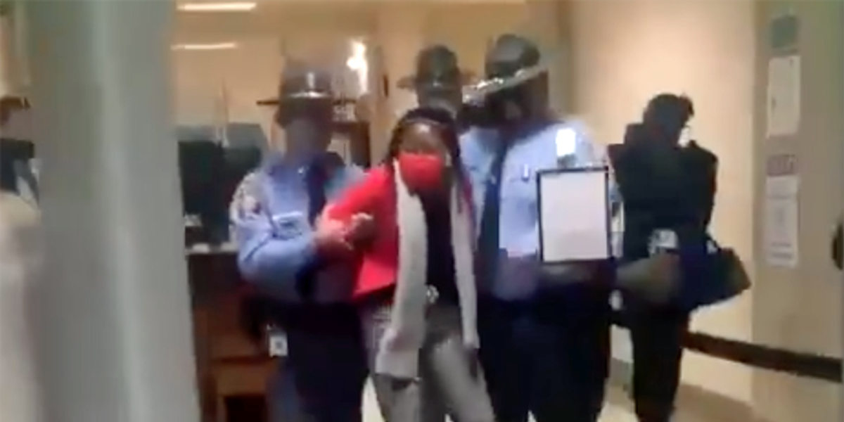 WATCH State Patrol arrests Dem lawmaker as Brian Kemp signs