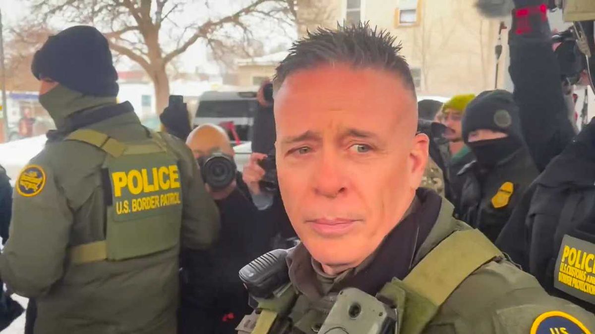 Border Patrol chief has bag of chips dumped on him as MN protesters shout 'Nazi!'