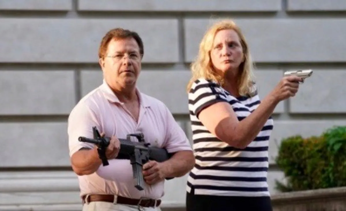 Missouri couple who brandished firearms at racial justice protesters suing to get their guns back: report