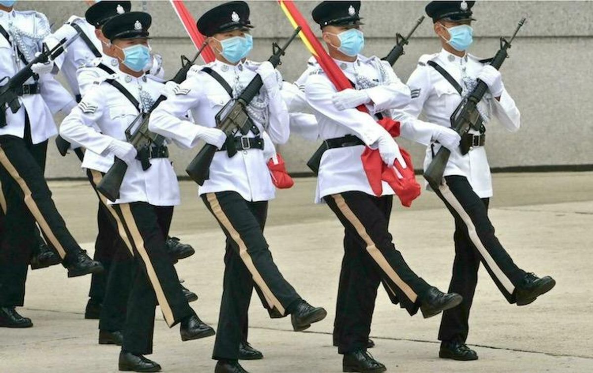 Hong Kong police switch to goose-stepping 'to show patriotism'