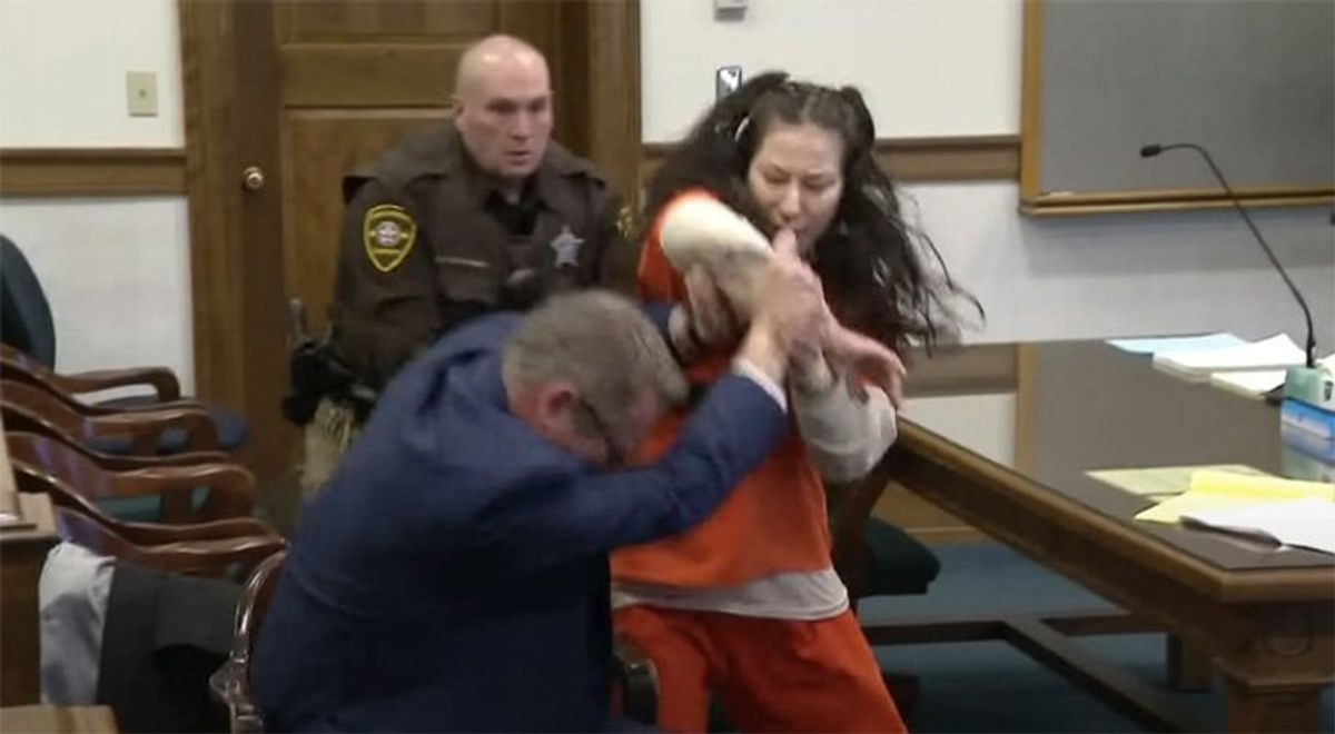 Woman accused of decapitating lover looking for a new lawyer after courtroom assault