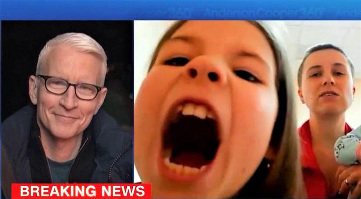 Anderson Cooper struggles to stop laughing as Ukrainian kids he's interviewing make faces at the camera