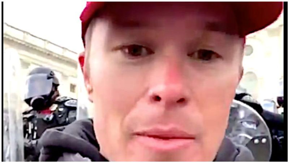 Texas lawyer is fired after video shows him trying to breach the U.S. ​Capitol