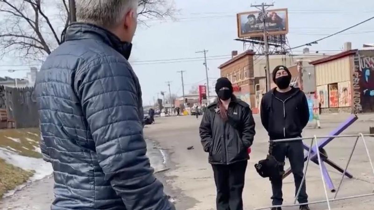 'You need to get in your car and go': Disturbing clip shows the 'volatile' scene at the George Floyd Memorial