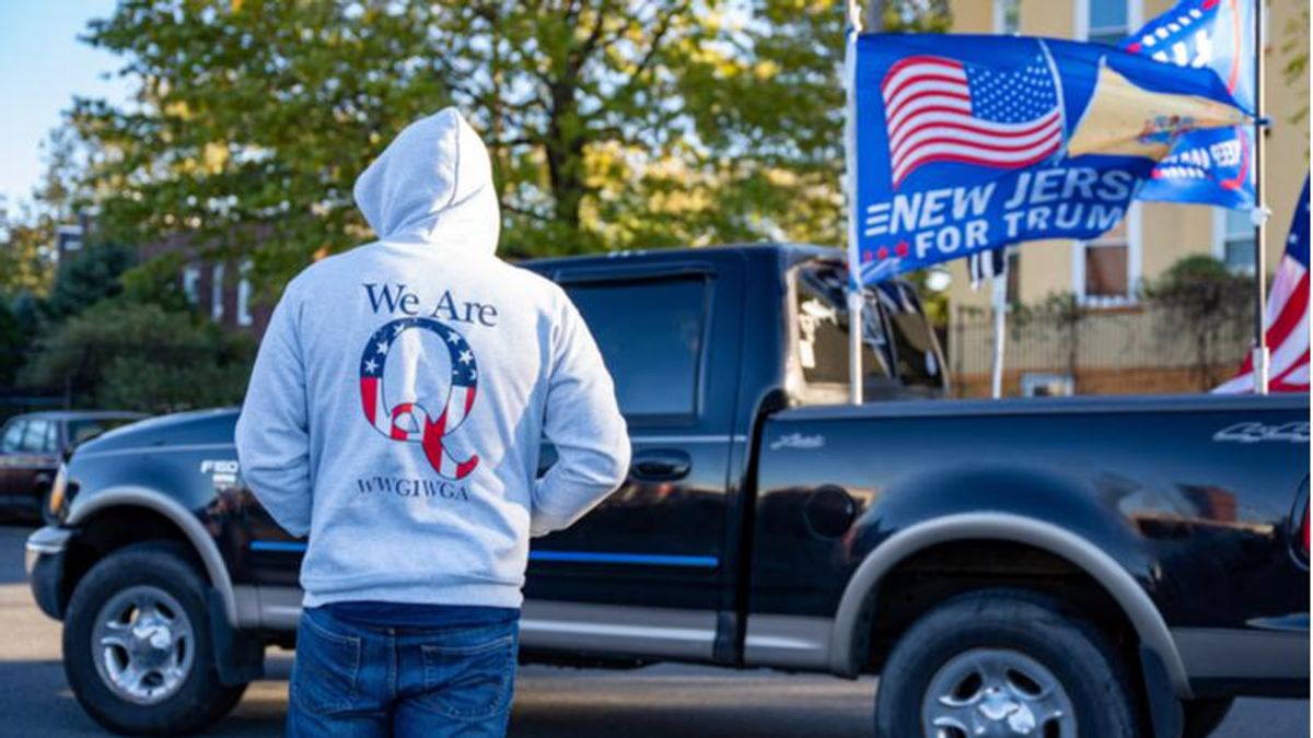 QAnon adherents believe Trump's mounting legal troubles are all part of 'the plan'