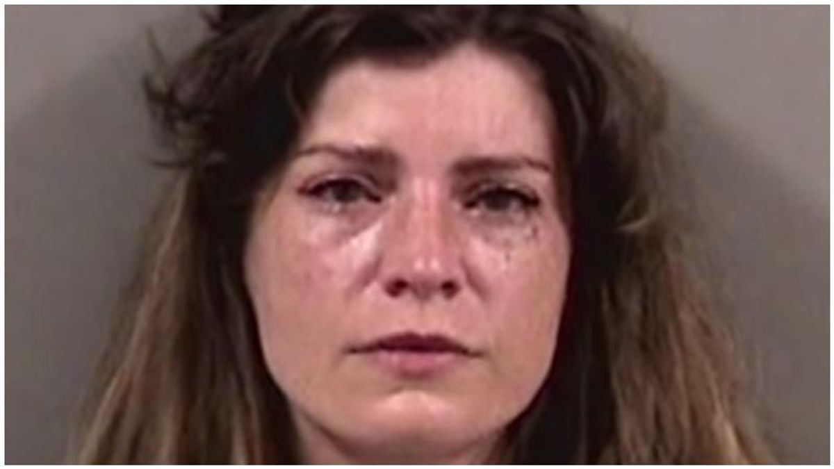 Woman charged with a hate crime after she and her boyfriend cornered Black Amazon driver and blocked him from leaving