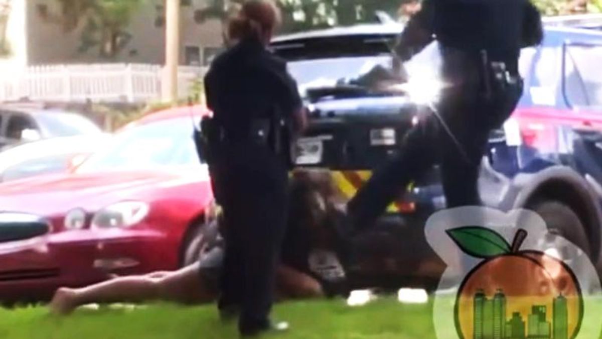 Family 'horrified' after video shows cop kicking woman in the face as she lies handcuffed on the ground