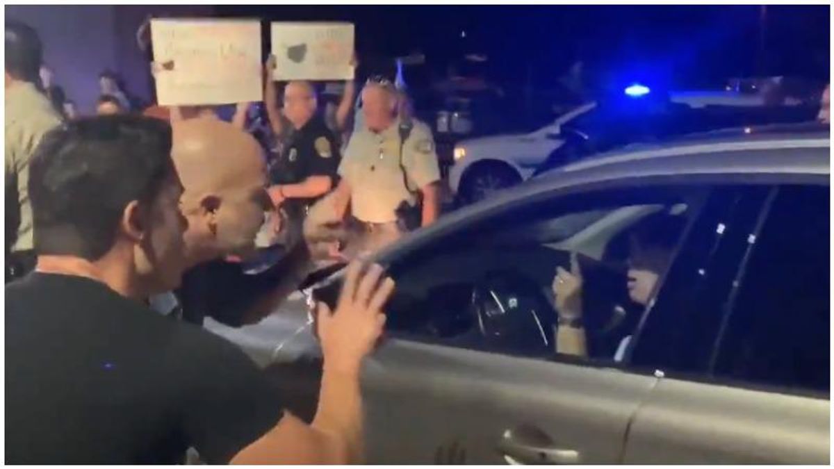 ‘We'll find you!' Turmoil erupts outside school board meeting as anti-maskers threaten medical professionals