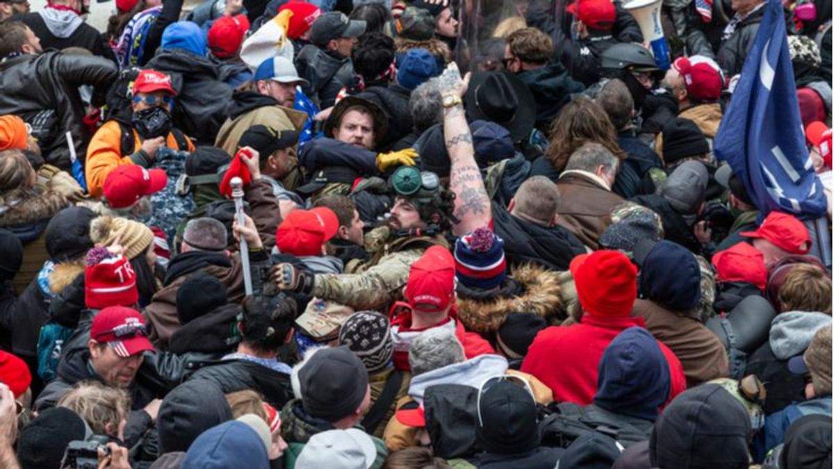 Feds bust Oklahoma Trump supporter who pushed a photographer off a wall during Capitol riot