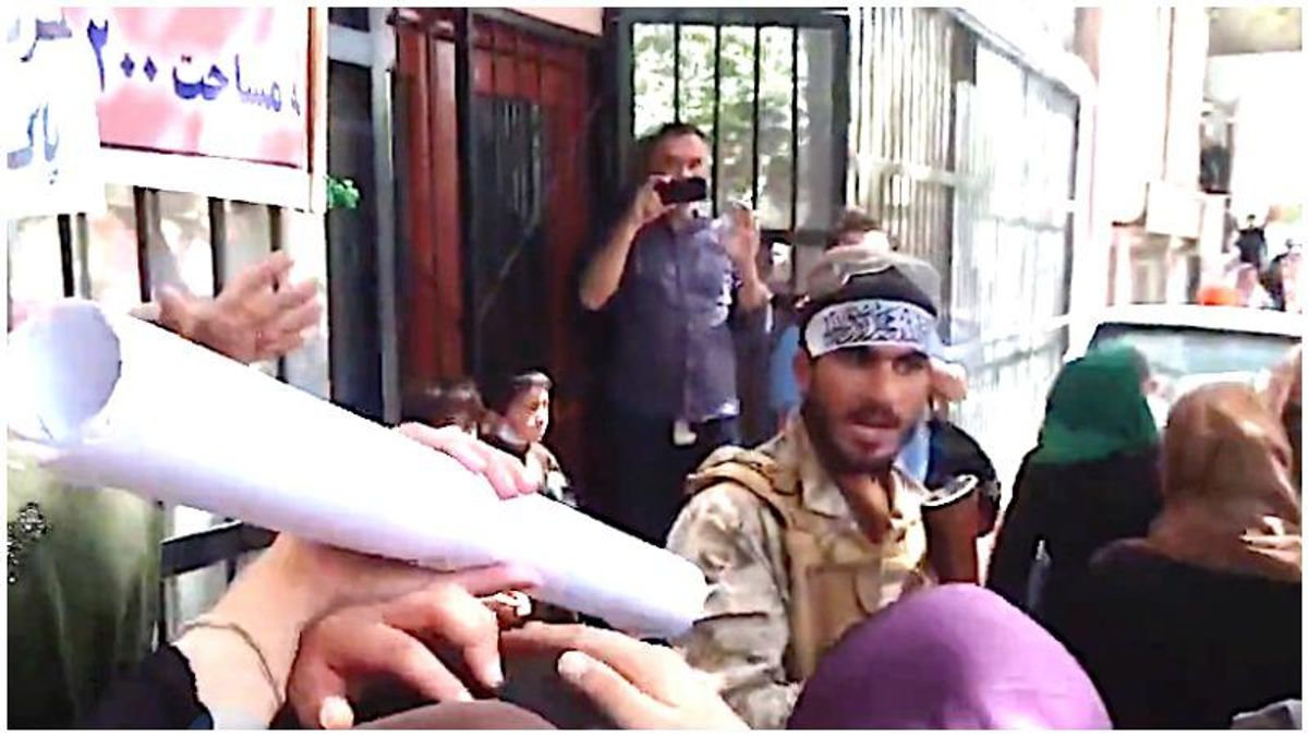 Taliban fighters look confused as protesting women blow past them unintimidated