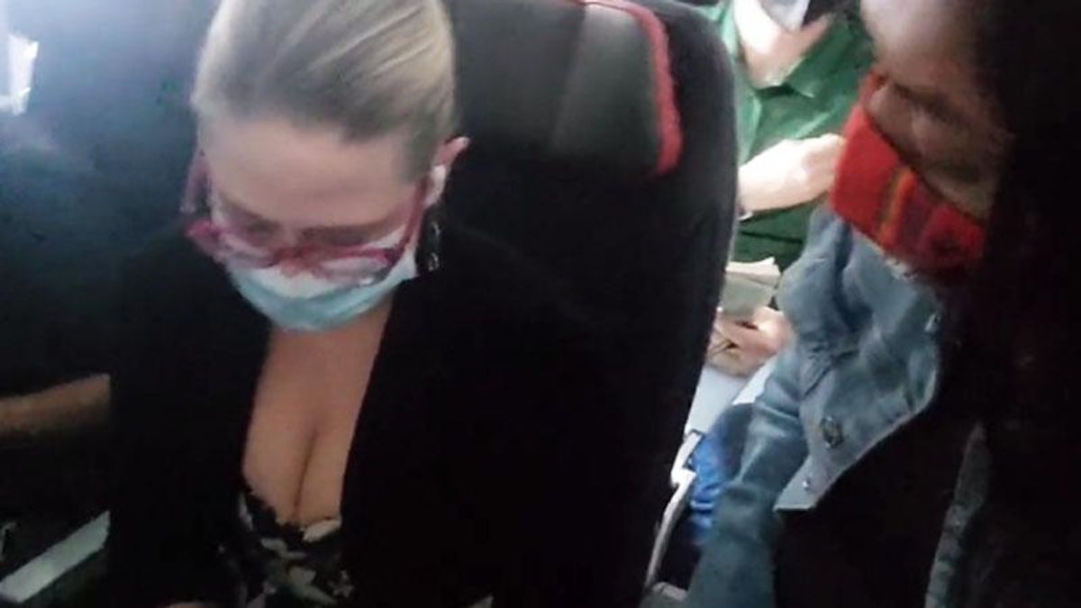 An activist confronted Kyrsten Sinema on a flight to ask for her support -- she got silence