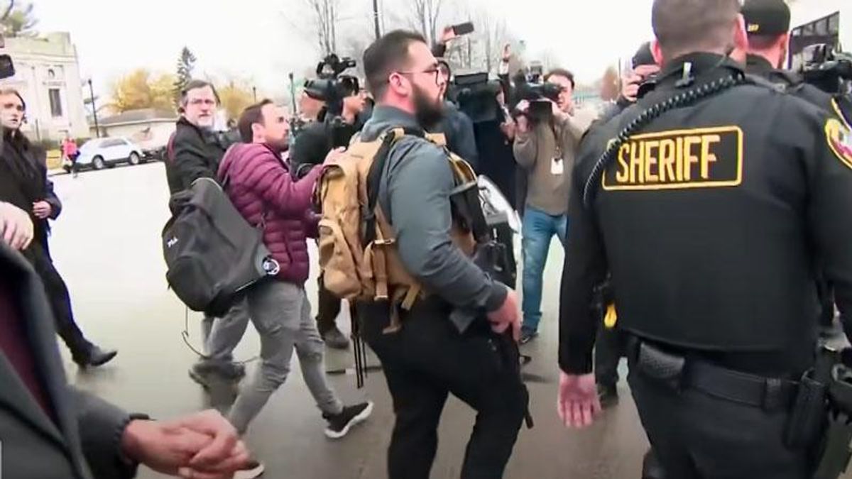 Man spotted with AR-15 outside Kyle Rittenhouse trial confirms he is a fired Ferguson police officer