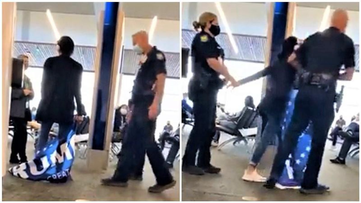 Trump supporter smacks phone out of woman's hand -- and is immediately hauled off by airport police