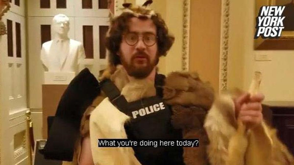 Judge's son who dressed as a caveman and stole police shield pleads guilty to MAGA riot felony charges