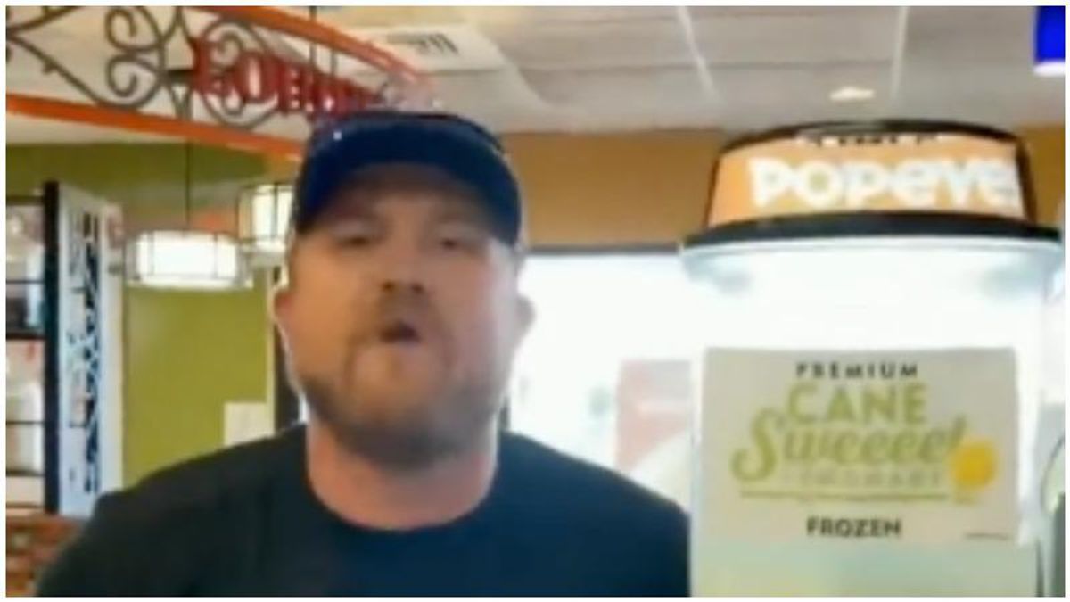 'I’ma hang you from a tree!' Enraged man caught on video hurling the N-word at Popeyes fast-food worker