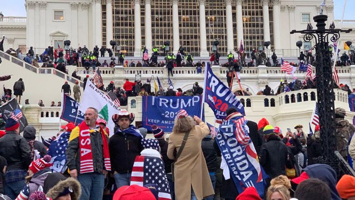 Pa. Senate GOP candidate Kathy Barnette photographed marching toward Capitol with Proud Boys on Jan. 6
