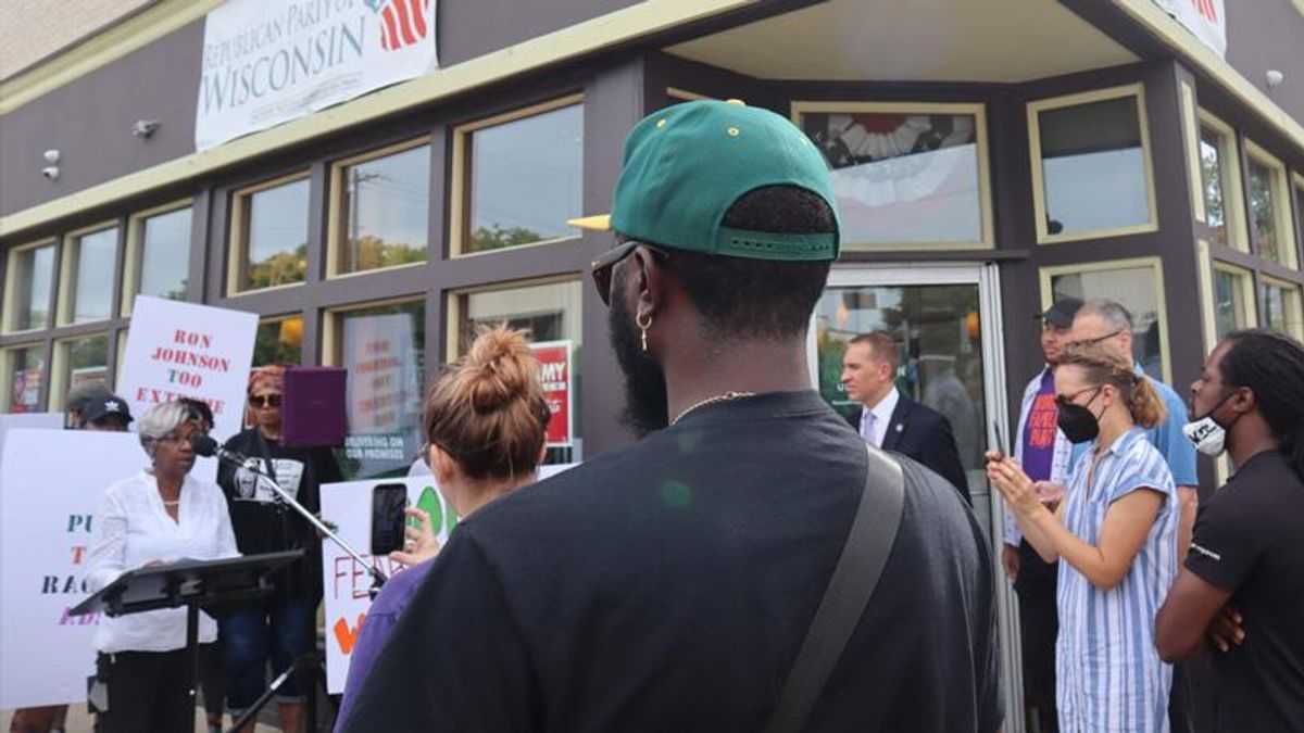 Protesters outside Milwaukee GOP office denounce ‘racist’ ads