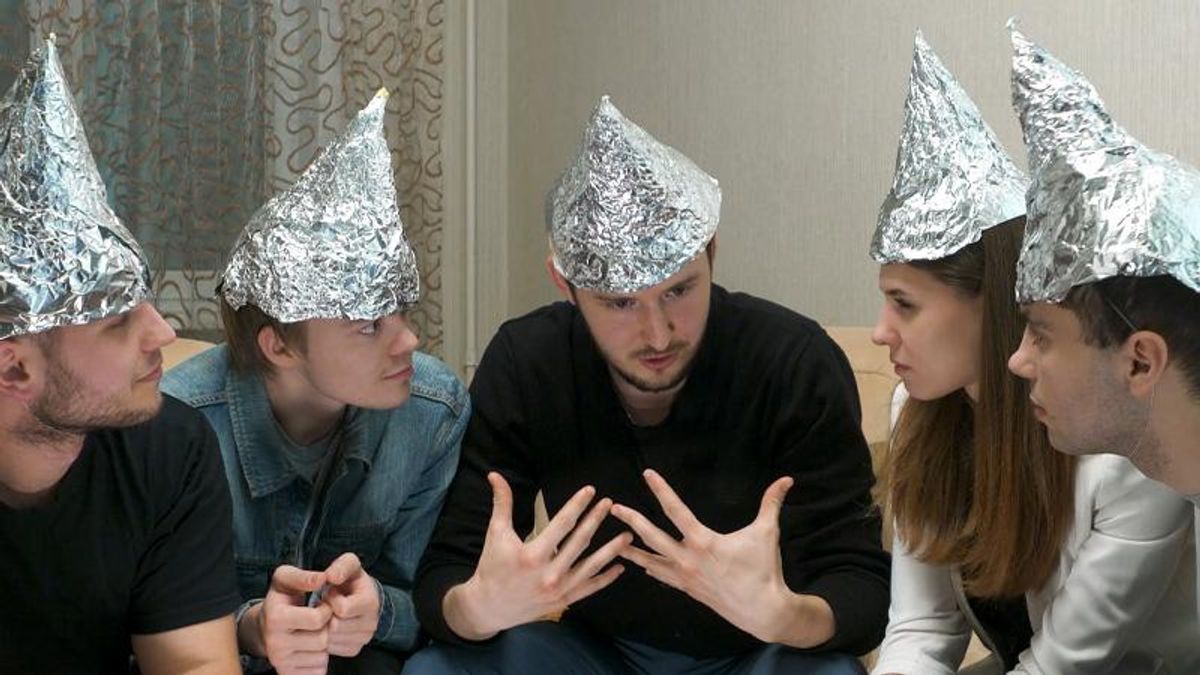 How to talk to someone about conspiracy theories in 5 simple steps — according to experts