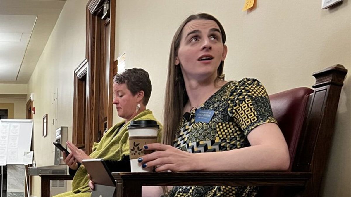 Zephyr working from bench outside Montana House floor; while her committee meetings cancelled
