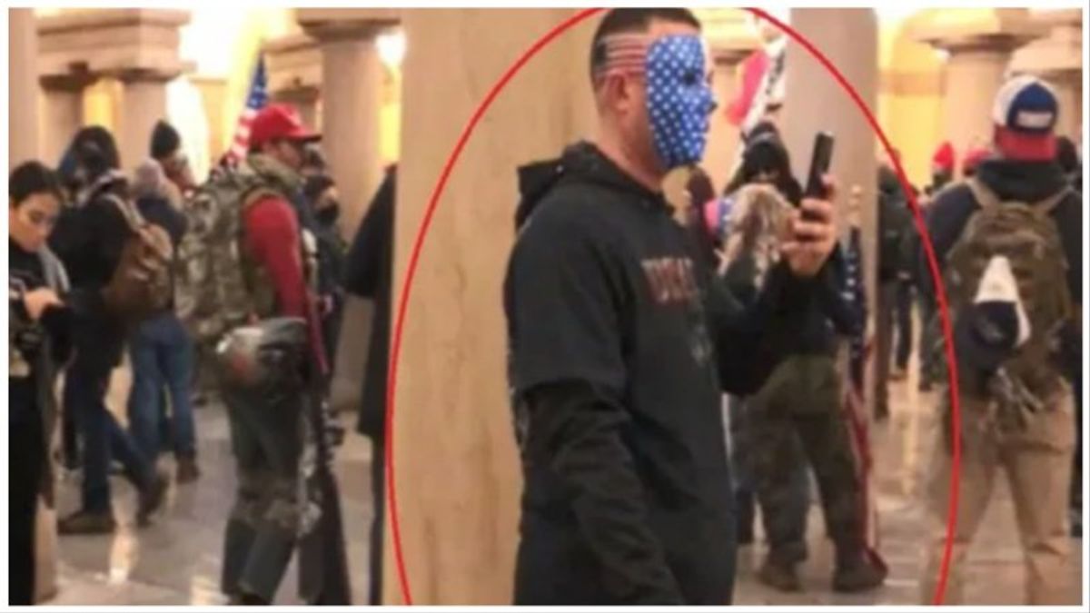 Man accused of storming the Capitol with American flag painted on his head