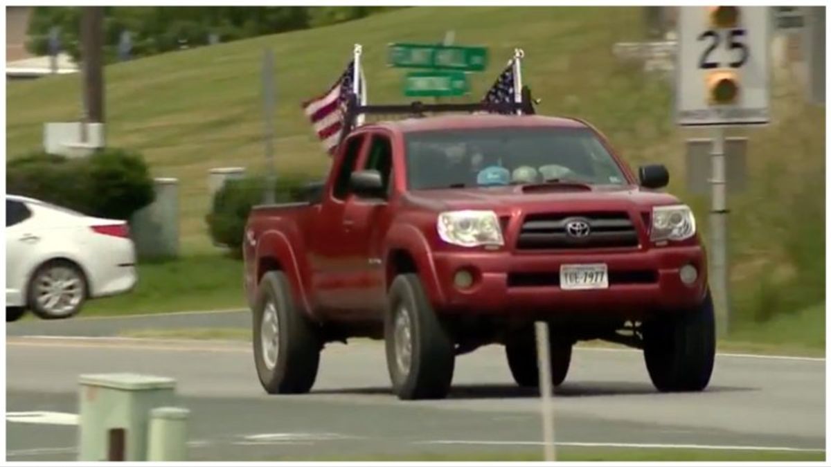 High school student refuses order from school to remove American flags from his truck