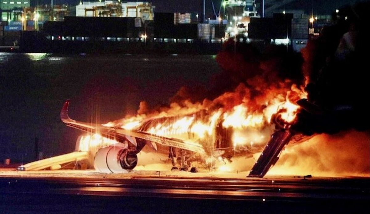Japan Airlines plane on fire on runway at Tokyo's Haneda airport: TV images
