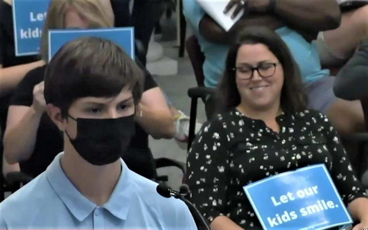 Anti-maskers start laughing at teen after he tells school board his grandmother died from COVID-19