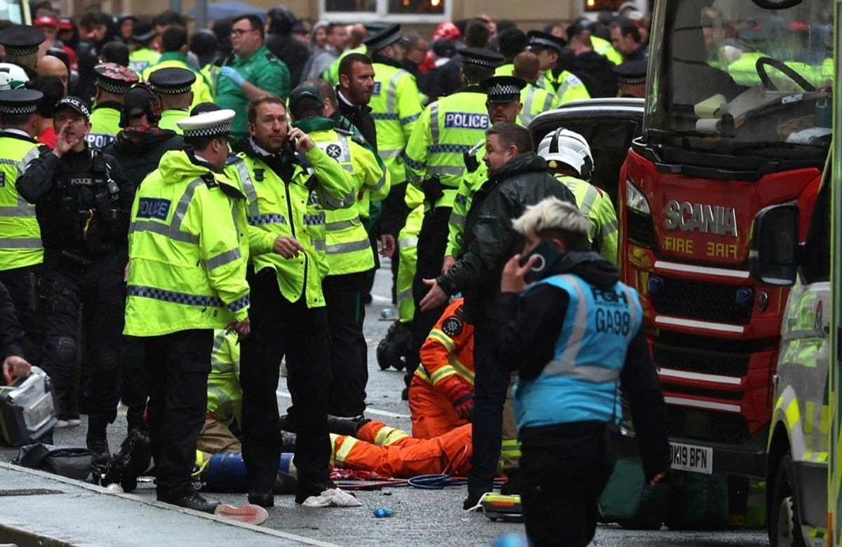 Many hurt as car rams into parade celebrating Liverpool soccer triumph