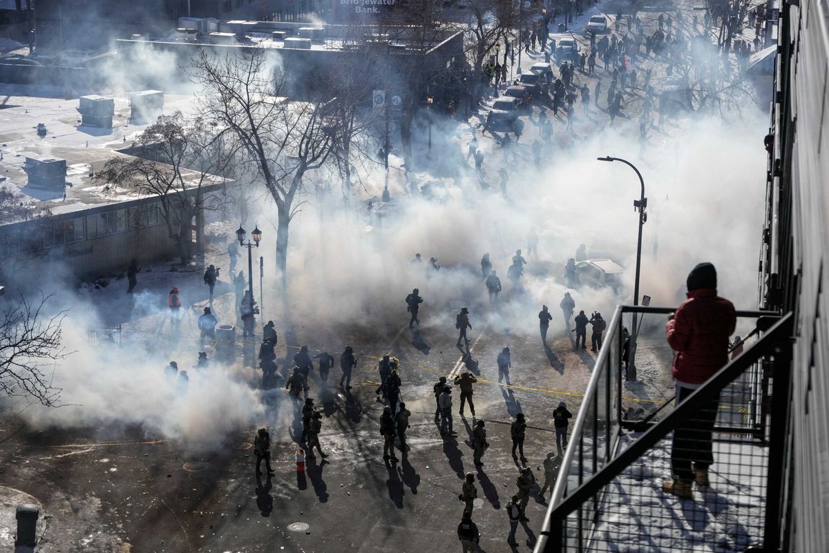 Chaos in Minneapolis as bystanders clash with law enforcement after shooting: 'I'm angry!'