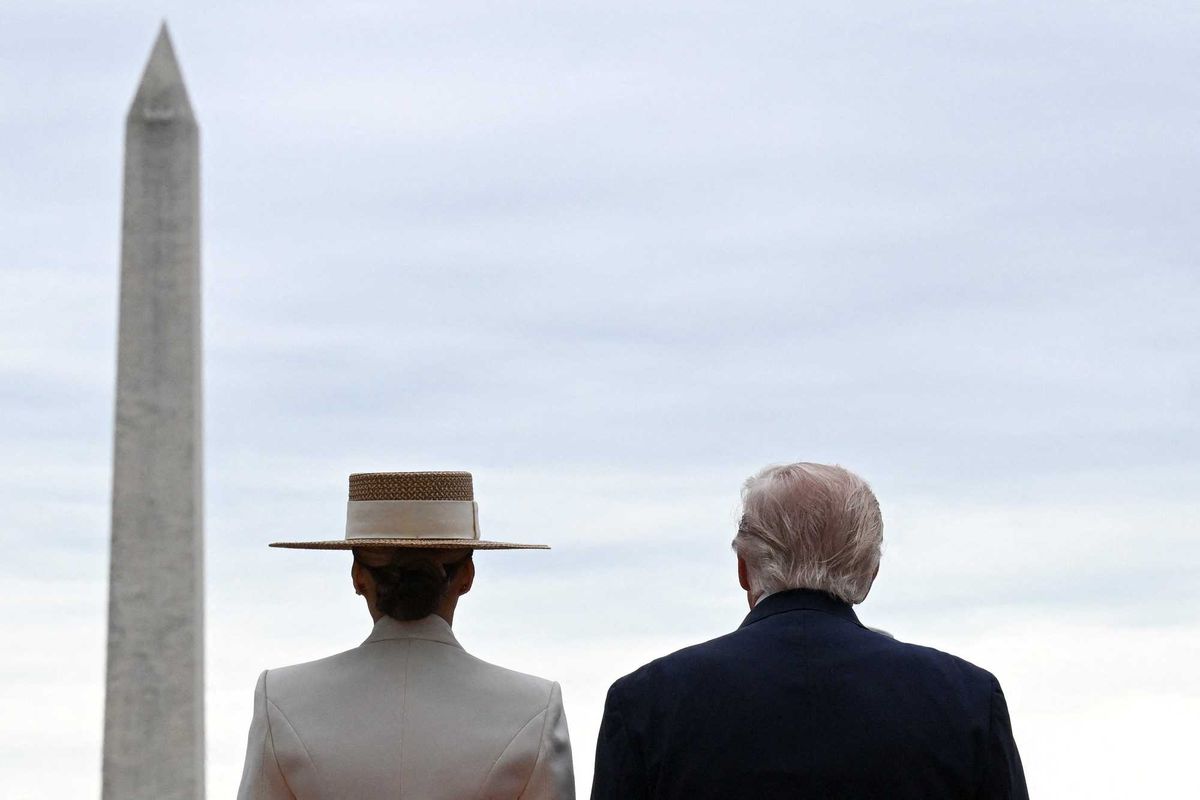 Photographer captures 'awkward' Trump moment: 'Patted the first lady on the tooshie'