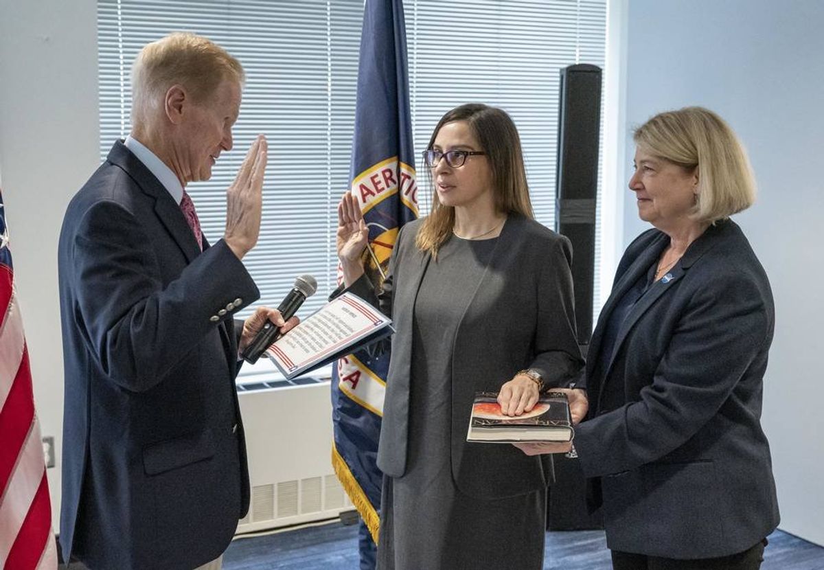 New NASA official celebrated for being sworn in on Carl Sagan book