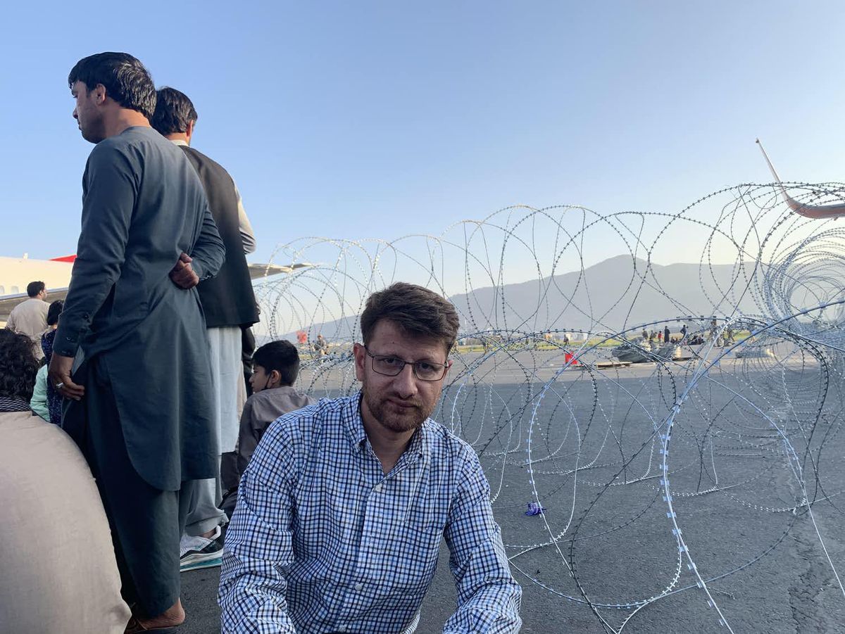 An Afghan American scholar describes his fear-filled journey from the chaos at Kabul airport to a plane bound for home in the US