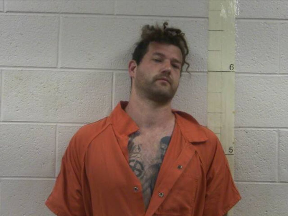 Neo-Nazi leader charged with child abuse, domestic violence