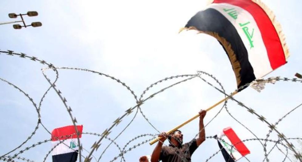 Thousands of protesters break into Baghdad 'Green Zone' and ransack parliament