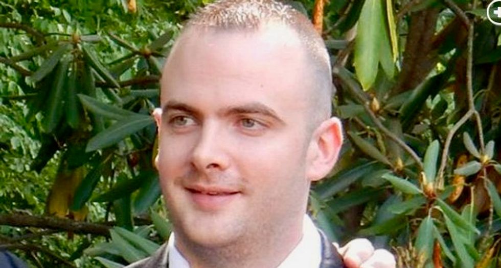 New York City police officer charged with murder in woman's shooting