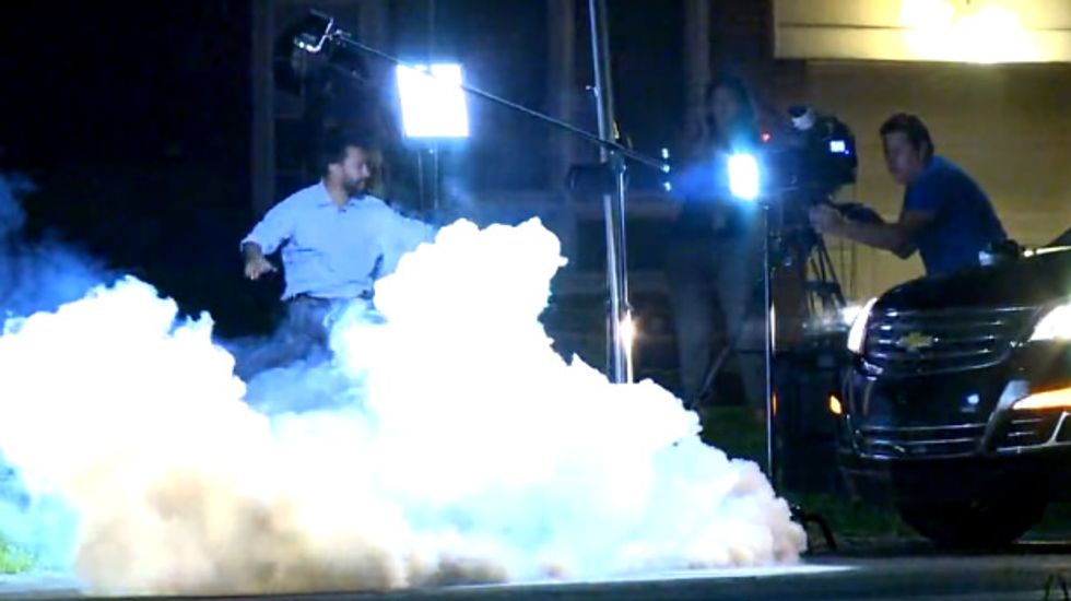'Holy sh*t!' Watch as Ferguson cops fire tear gas and bean bags at news crews