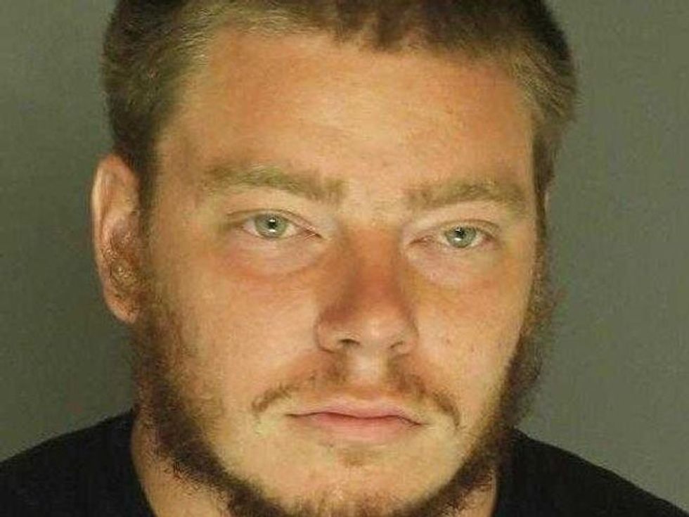 An angry racist fatally shot a white man who defended a black friend from being harassed: police