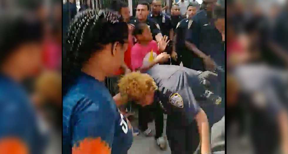 WATCH: Brawl breaks out between neighbors and New York police as officers drag and arrest an unconscious man